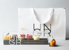 株式会社ヨックモック 求人 ミニャルディーズ専門のキッチン併設パティスリー「UN GRAIN」。伝統を守りながら新しい事にも挑戦していきます！